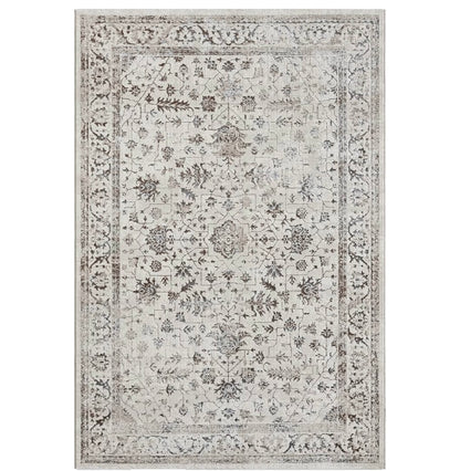 Zoom sur la texture sculptée et l'effet  du tapis CREATION crème, montrant les détails des motifs 3D élégants.