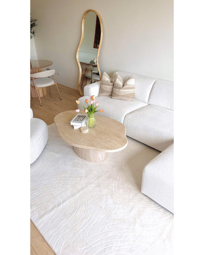 Tapis de salon STILO 01 couleur crème vu de haut mettant en avant son design épuré.