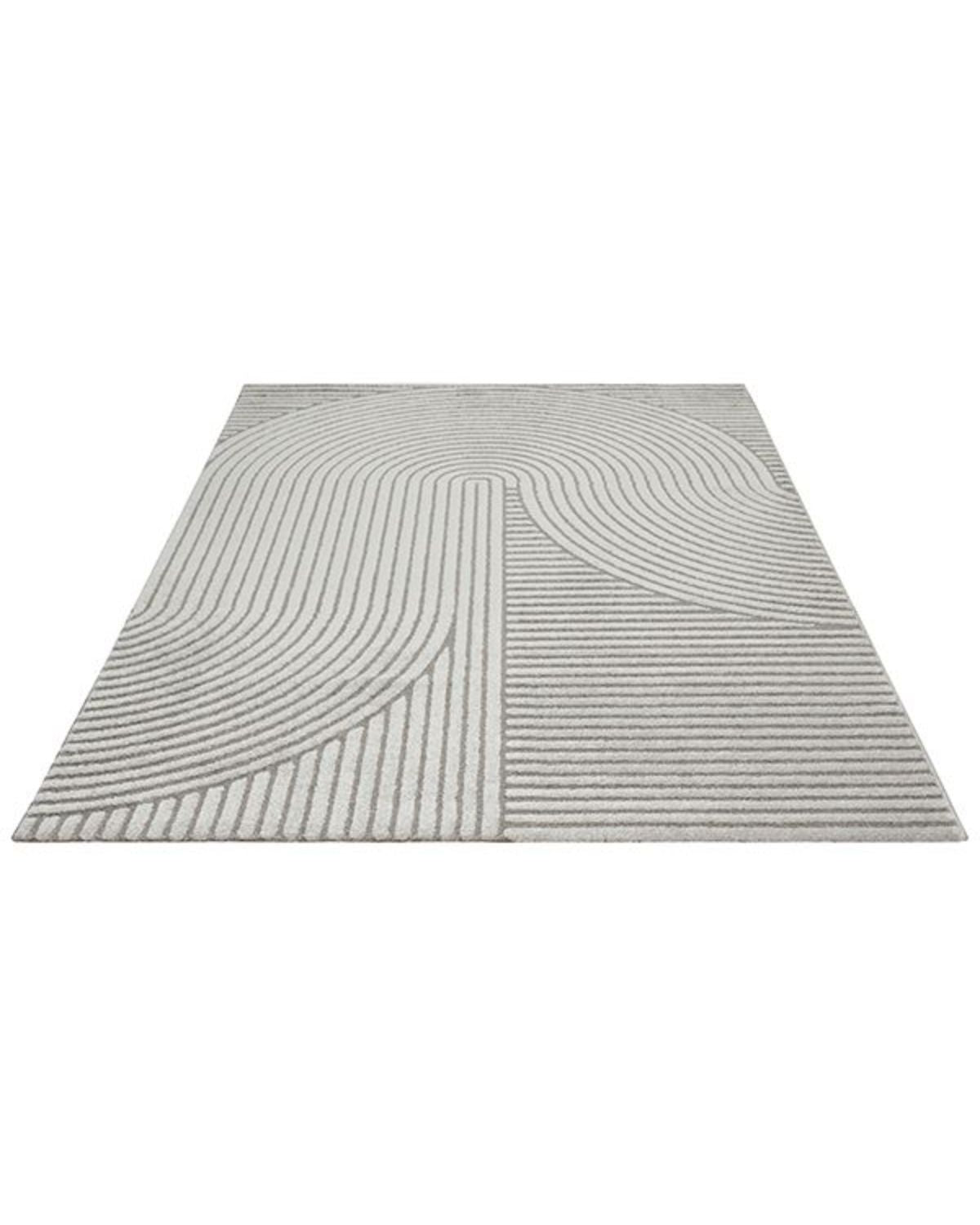 Vue verticale montrant la répétition élégante des motifs en arc du tapis ELIO 51, idéal pour agrandir visuellement l'espace.