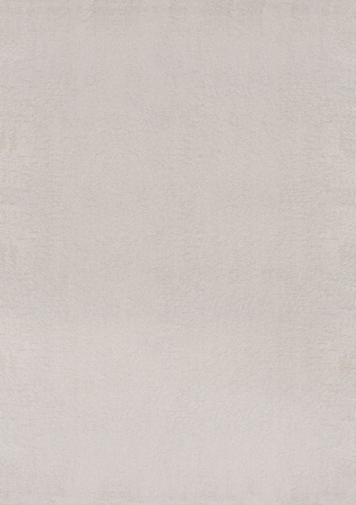 Tapis rectangulaire LOFT beige présenté sur fond blanc uni, montrant la couleur blanc cassé pure et la texture dense à poils hauts.