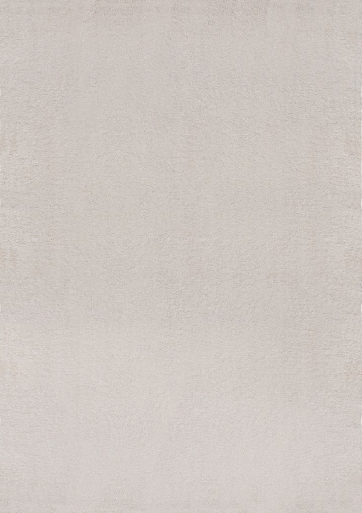 Tapis rectangulaire LOFT beige présenté sur fond blanc uni, montrant la couleur blanc cassé pure et la texture dense à poils hauts.