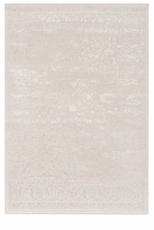 Vue d'ensemble du tapis CREATION vintage crème, motifs persans détaillés avec relief 3D sculpté sur fond blanc épuré.