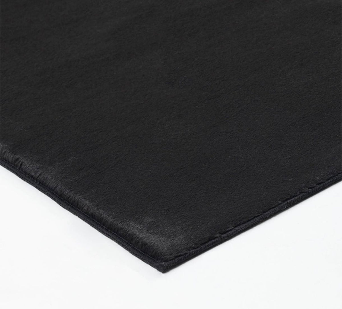 Envers antidérapant haute performance du tapis noir FOCUS, grip de sécurité pour tous types de sols.